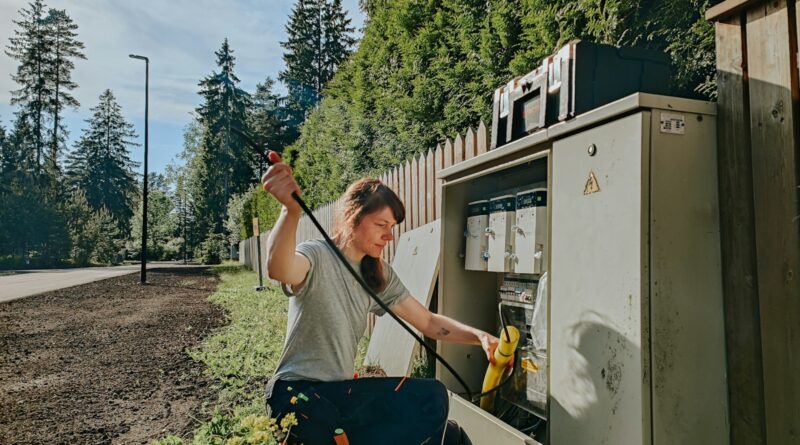 a man holding a drill